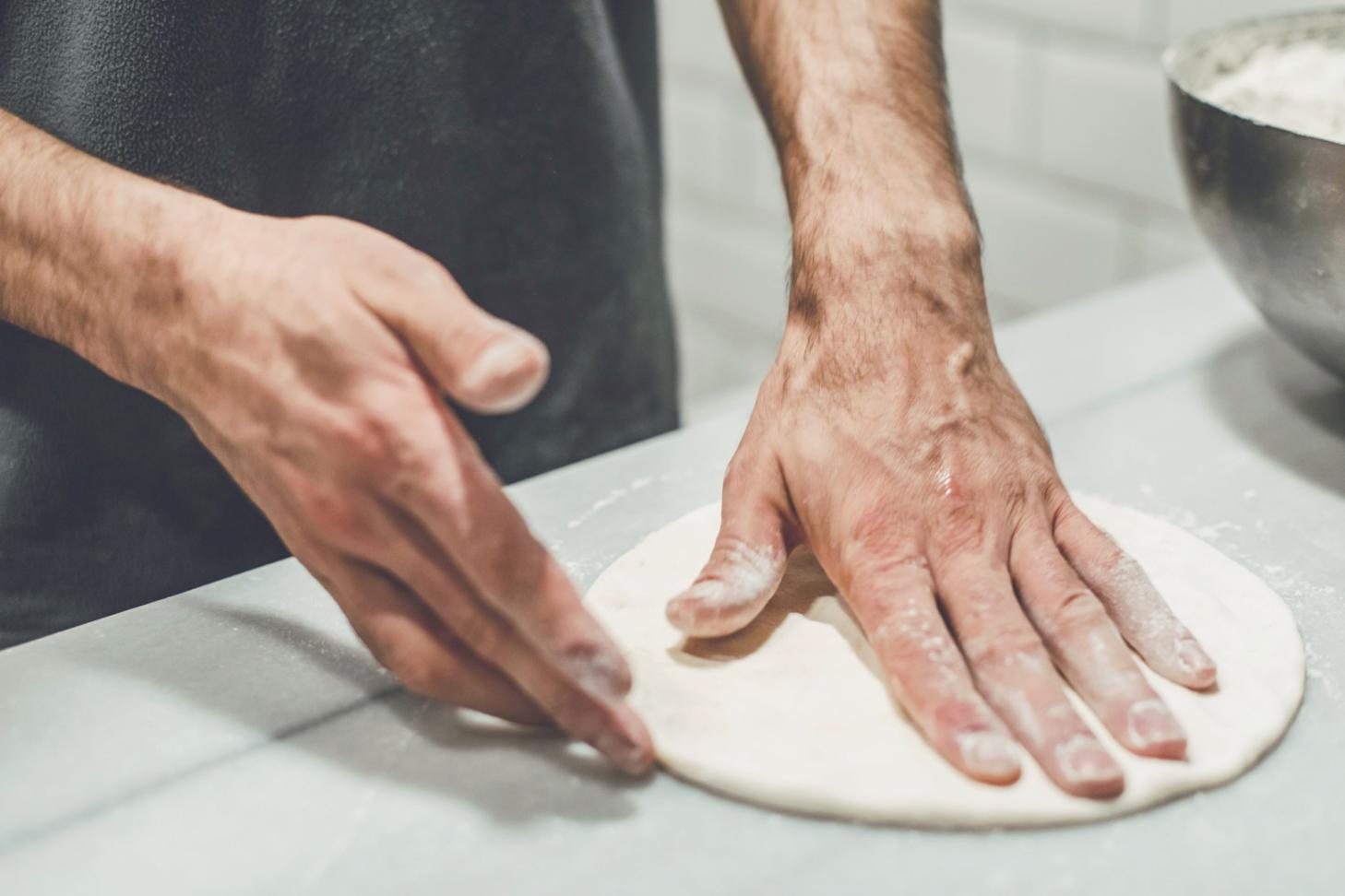 Temperature probe measuring internal doneness of sous-vide prepared meat